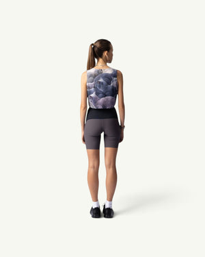 Amateur British Shorthair crop singlet with cat print, worn by a woman from the back with grey athletic shorts.