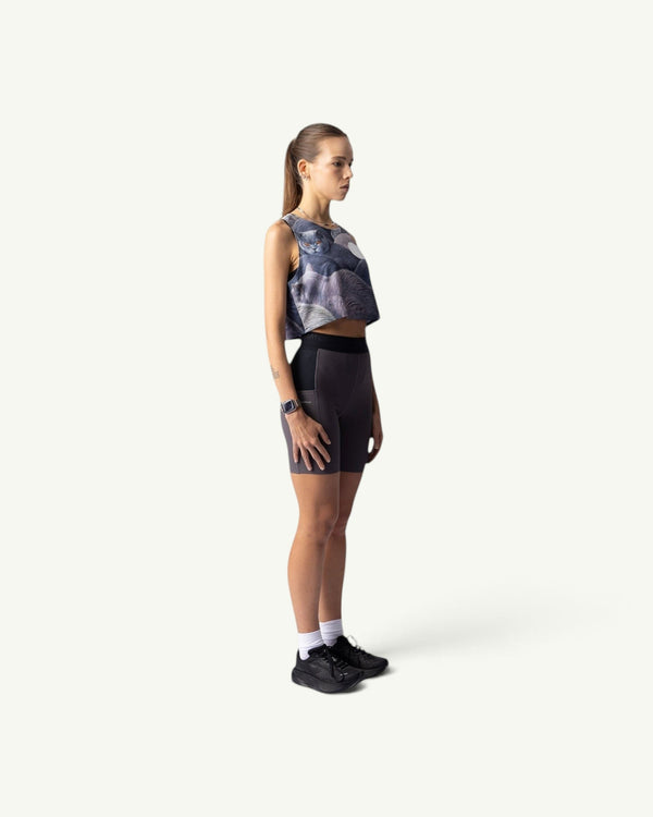 Amateur British Shorthair crop singlet featuring a cat print, worn by a model in profile with grey athletic shorts.