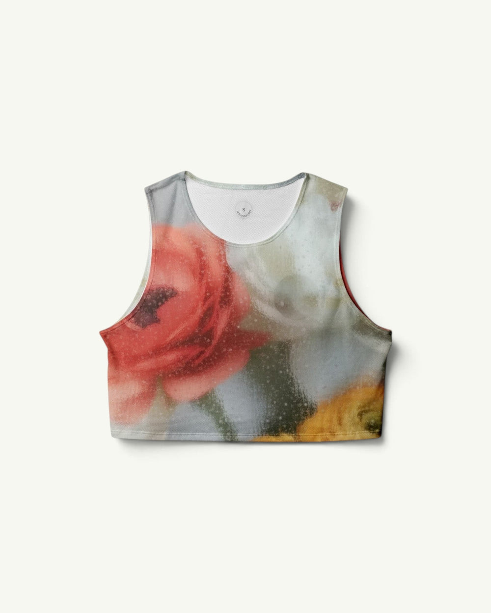 Amateur Frosted Glass crop singlet featuring a soft-focus floral print in red, white, and yellow on stretch fabric.