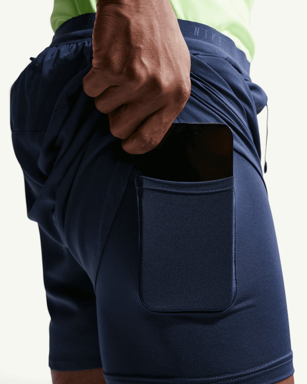 Nike ACG men's navy blue 2-in-1 running shorts with a supportive inner liner and a convenient phone storage pocket.