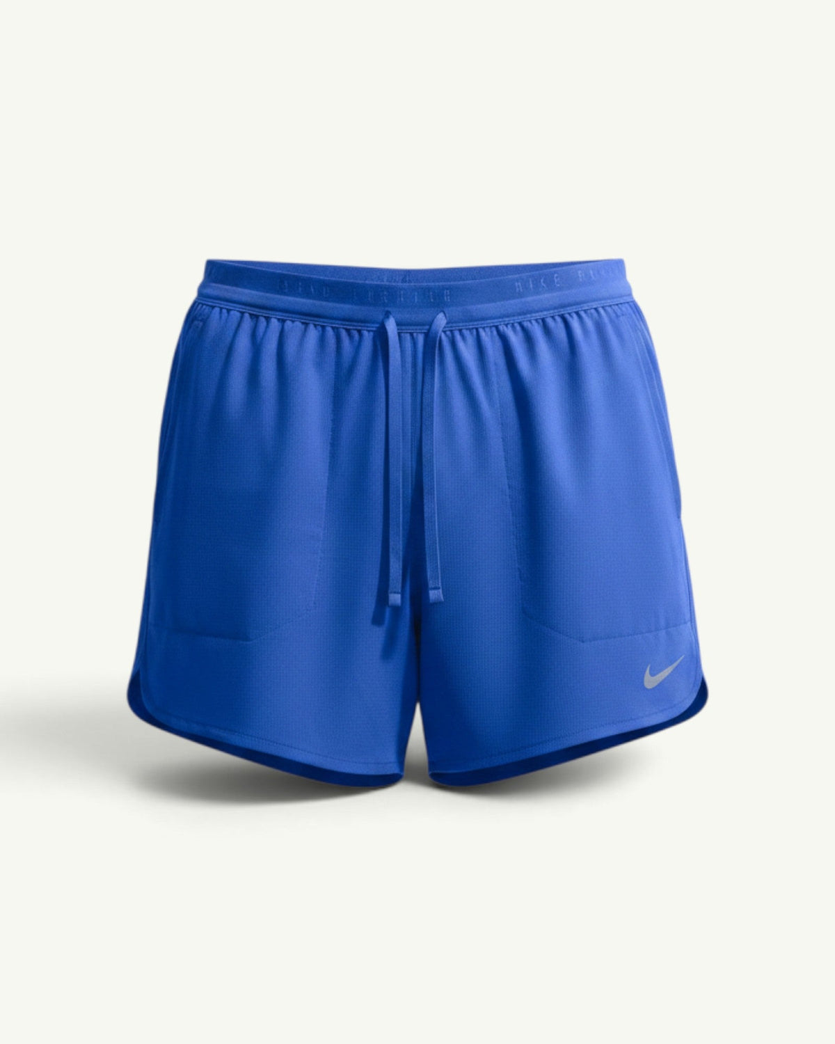 Amateur Nike men's blue Stride 5-inch brief-lined training shorts with reflective logo and elastic drawstring waist.
