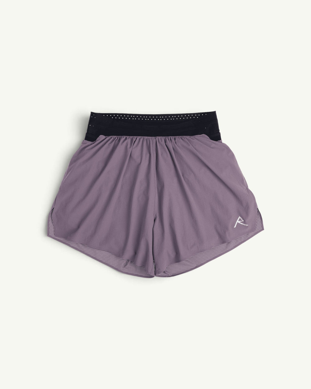 Raide Men's TrailTech 5-inch mountain running shorts in purple with a black waistband and reflective logo detail.