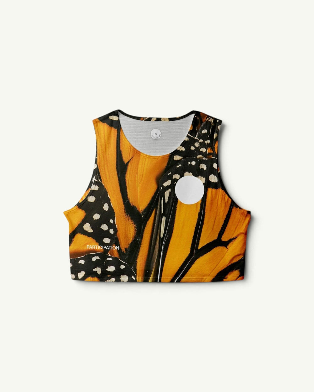 Participation Monarch crop singlet featuring a vibrant orange and black butterfly wing print on quick-drying stretch fabric.