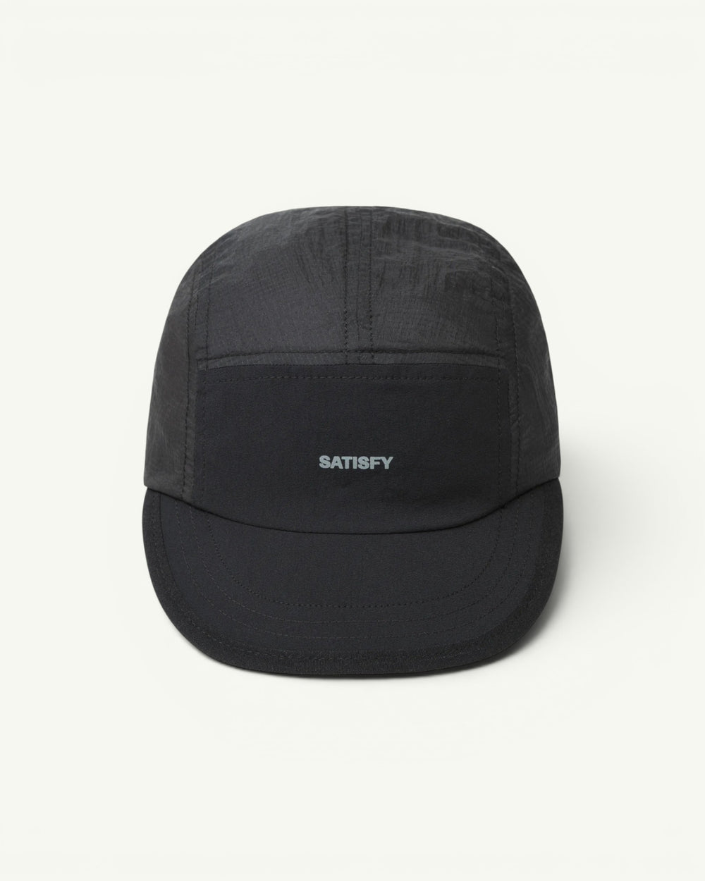 The trail cap that disappears. Ultralight, water-repellent Rippy ripstop from Italy with a SilverShell brim that reflects heat back where it came from. A short brim that won't soak up sweat, a stretch front panel that takes a headlamp, and a bungee cord for a locked-in fit. One size, all conditions.