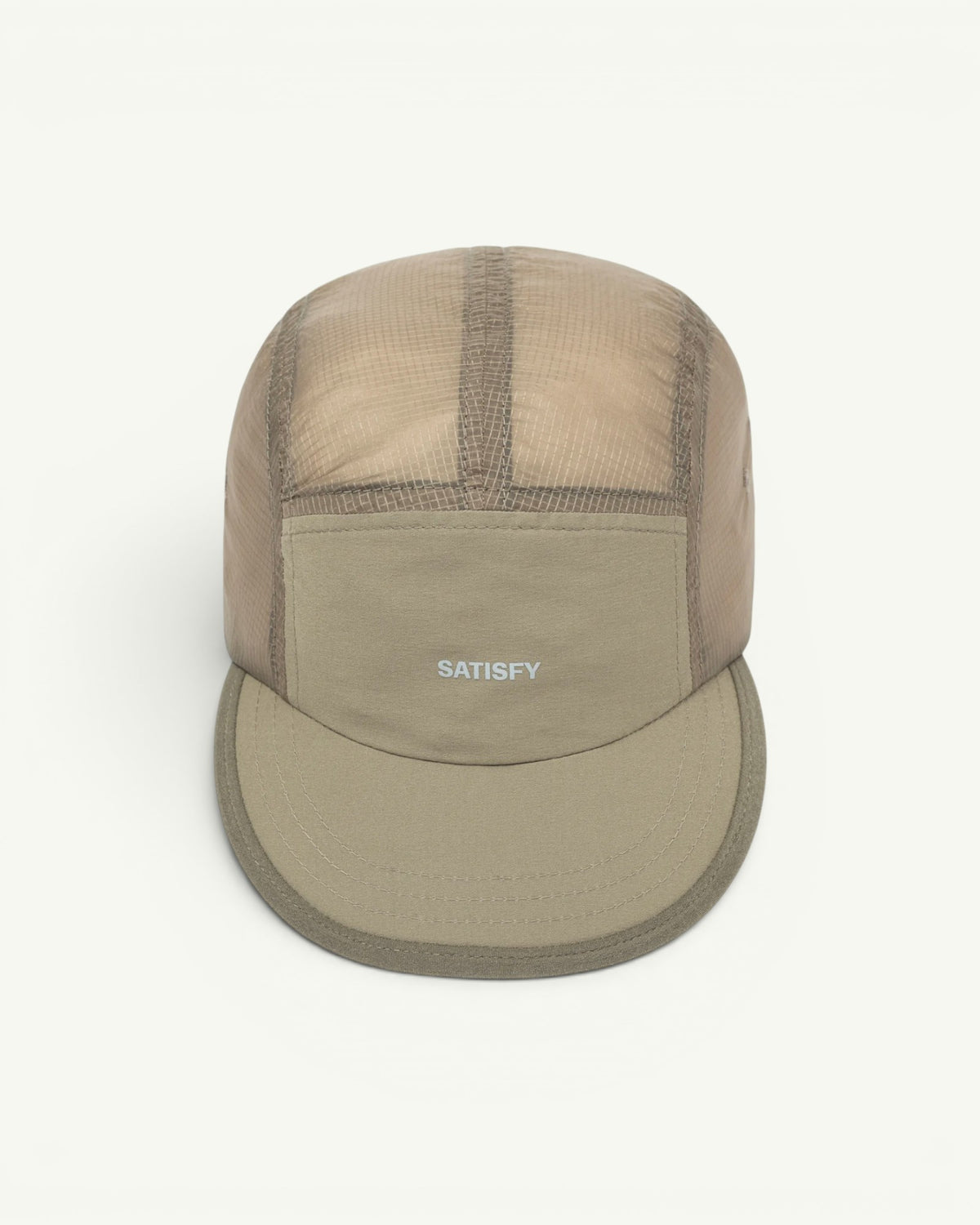 The trail cap that disappears. Ultralight, water-repellent Rippy ripstop from Italy with a SilverShell brim that reflects heat back where it came from. A short brim that won't soak up sweat, a stretch front panel that takes a headlamp, and a bungee cord for a locked-in fit. One size, all conditions.