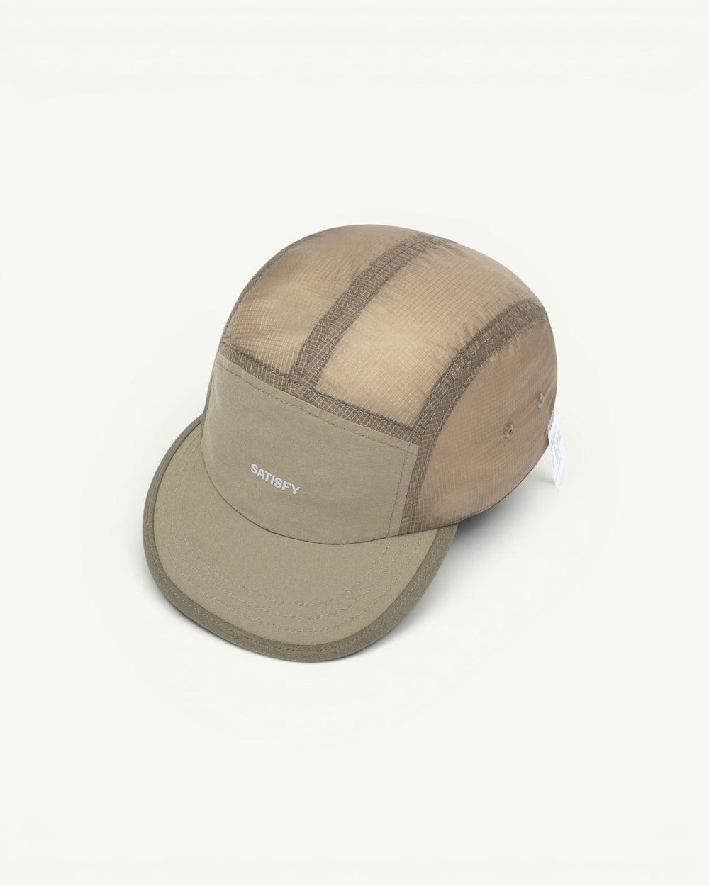 The trail cap that disappears. Ultralight, water-repellent Rippy ripstop from Italy with a SilverShell brim that reflects heat back where it came from. A short brim that won't soak up sweat, a stretch front panel that takes a headlamp, and a bungee cord for a locked-in fit. One size, all conditions.