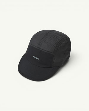 The trail cap that disappears. Ultralight, water-repellent Rippy ripstop from Italy with a SilverShell brim that reflects heat back where it came from. A short brim that won't soak up sweat, a stretch front panel that takes a headlamp, and a bungee cord for a locked-in fit. One size, all conditions.
