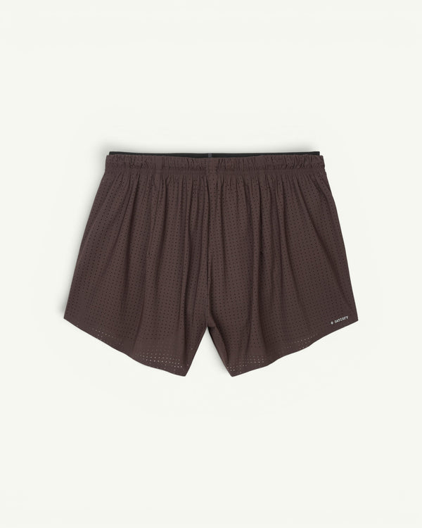 Shorts for going fast with next to nothing on. A 2.5-inch Space-O shell over an anti-chafe Justice technical-silk brief. The double waistband tucks the drawcords, hides a sweatproof phone pocket and carries a mini S-Carabiner for keys. Bonded seams, no rub. Race-short freedom with daily-run utility.