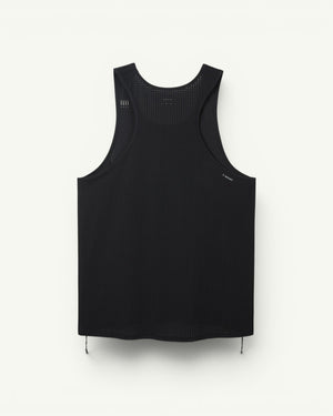 The race top at its most minimal. Space-O perforated micro jersey from Italy cools, dries fast and stretches four ways. Four S-Pins included for the bib, anti-chafe flat seams for the distance. A singlet built for start lines and sticky summer sessions.
