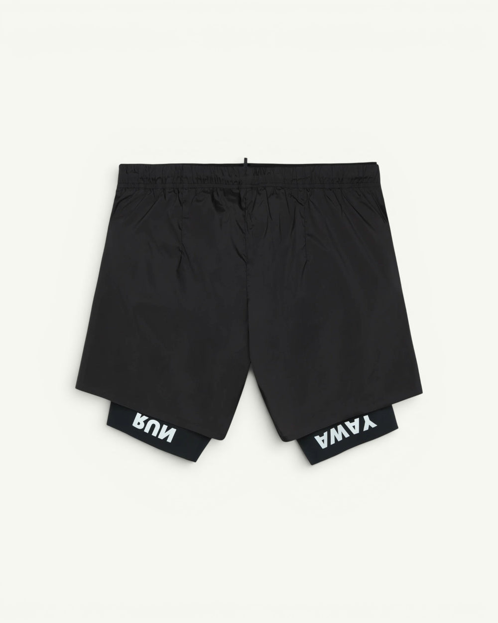 The long short for every run. A silky TechSilk shell from France over a Justice coldblack liner that blocks UV and holds a phone up to full size. Zippered back pocket for cargo, double waistband, bonded seams, reflective print for low light. Eight inches of coverage that still moves like silk.