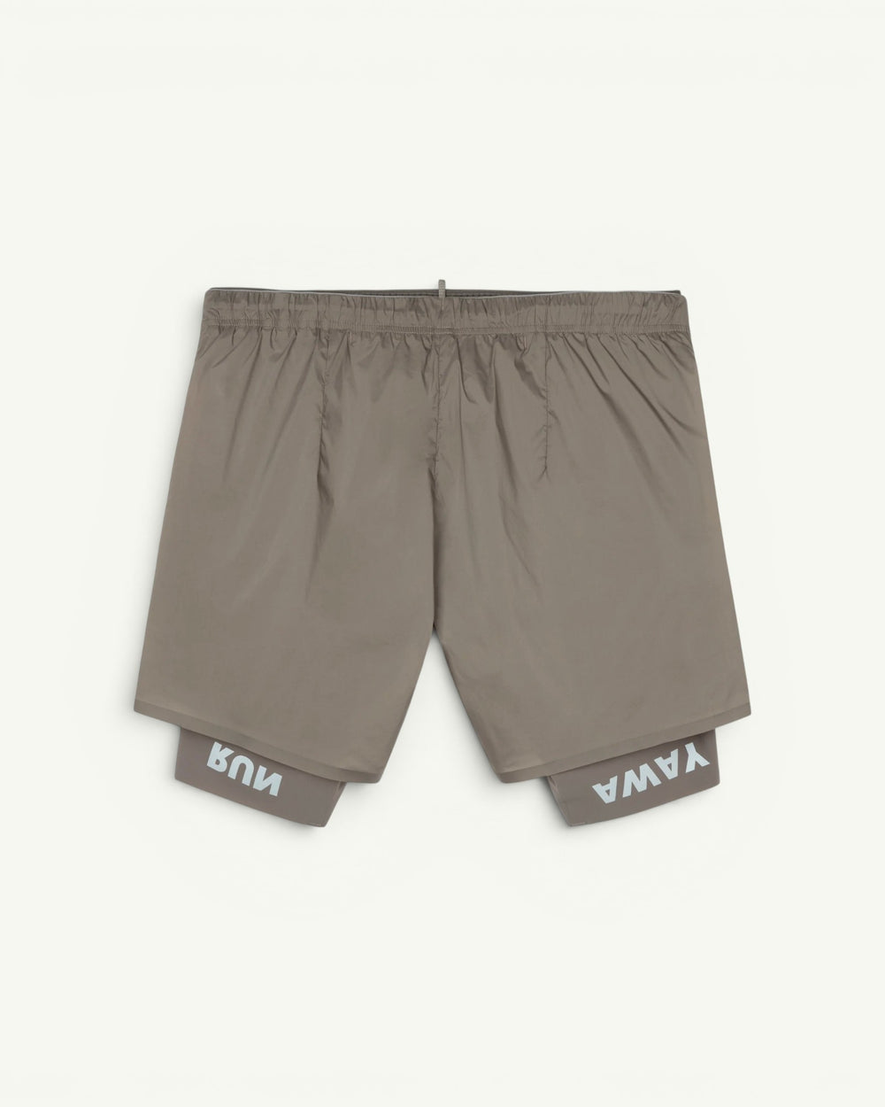 The long short for every run. A silky TechSilk shell from France over a Justice coldblack liner that blocks UV and holds a phone up to full size. Zippered back pocket for cargo, double waistband, bonded seams, reflective print for low light. Eight inches of coverage that still moves like silk.