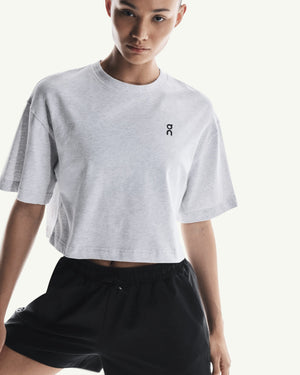 On Women's Club Boxy-T in light grey heather cotton-blend with a relaxed fit and small chest logo