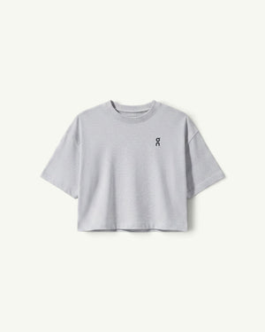 On Women's Club Boxy-T in light grey, featuring a relaxed fit, short sleeves, and a small logo on the chest.