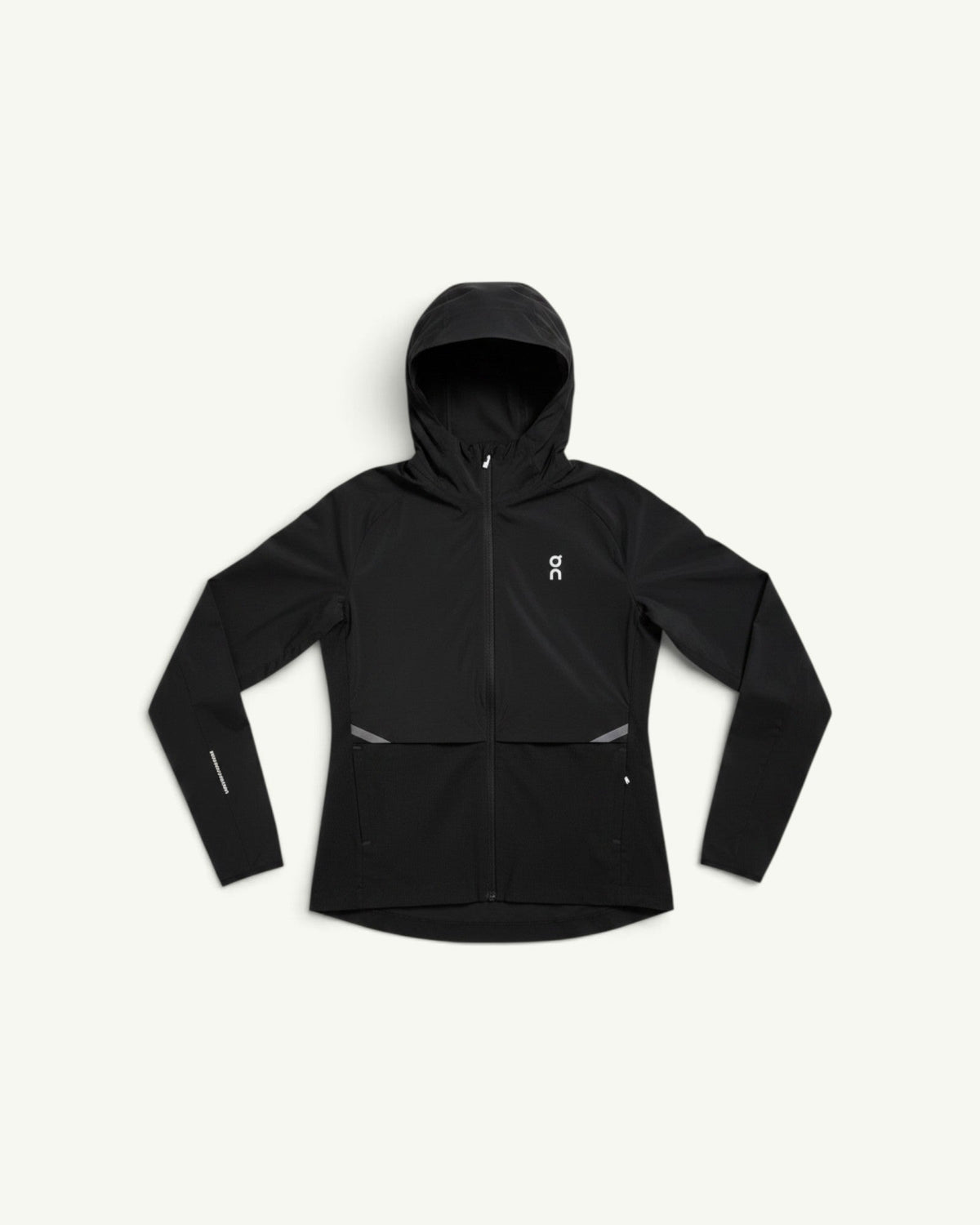 On women's black lightweight hooded running jacket with wind-blocking and water-shedding fabric