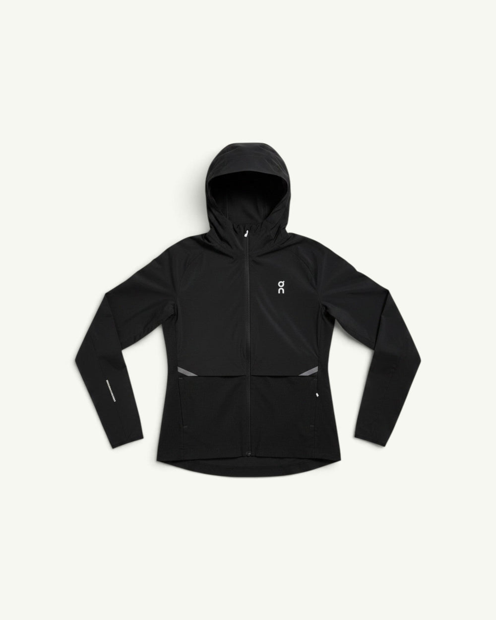 On women's black lightweight hooded running jacket with wind-blocking and water-shedding fabric