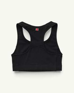 Amateur Women's Allston Bra in black, featuring a racerback design with a small red and white tab detail.