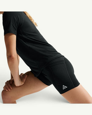 Amateur women's black high-waisted Dri-FIT trail running shorts with side pockets and logo detail
