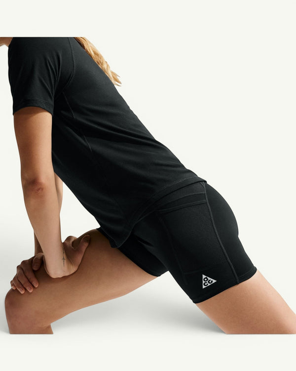 Amateur women's black high-waisted Dri-FIT trail running shorts with side pockets and logo detail