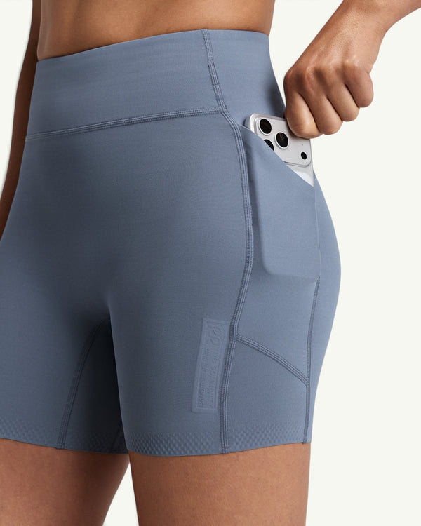 Amateur blue high-waist compression shorts with side phone pocket and moisture-wicking fabric