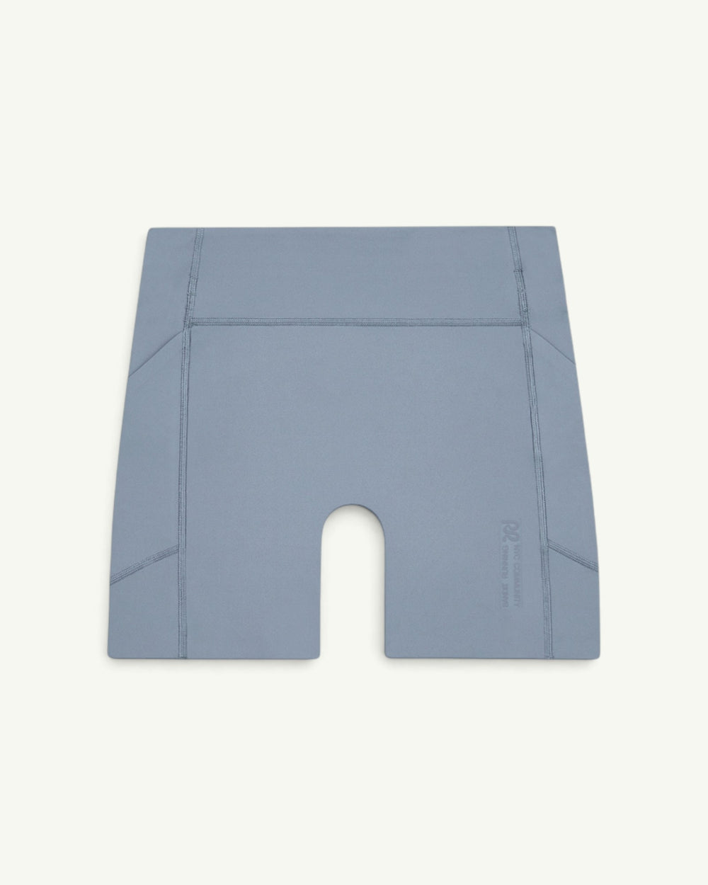 Amateur blue high-waist compression shorts with side pockets and moisture-wicking fabric for running.