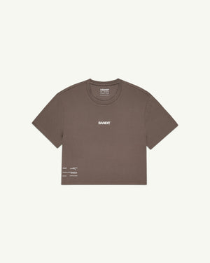Amateur women's brown Micromesh cropped run tee with crew neckline and reflective branding details.
