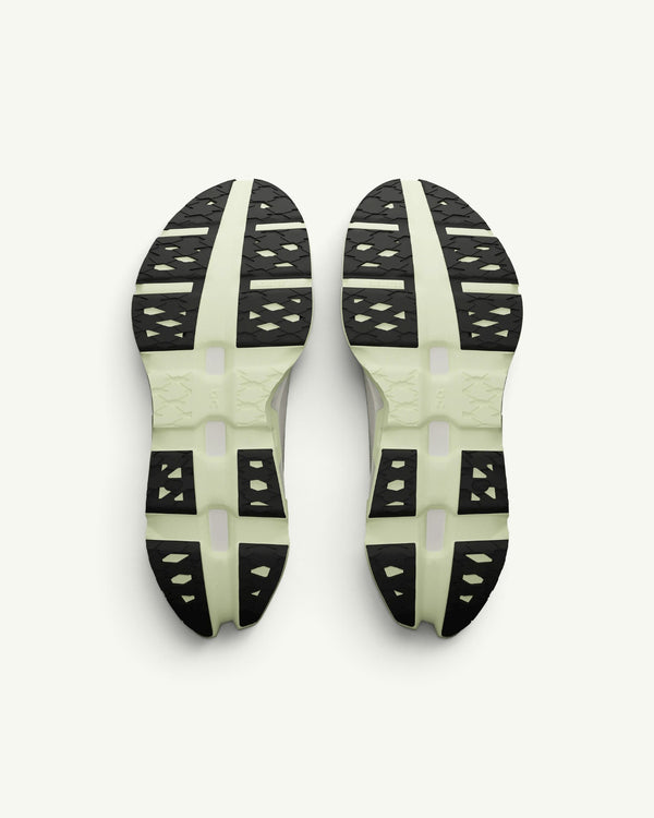 Amateur Men's Cloudmonster 3 Hyper running shoe outsoles featuring pale green CloudTec pods and black rubber grip
