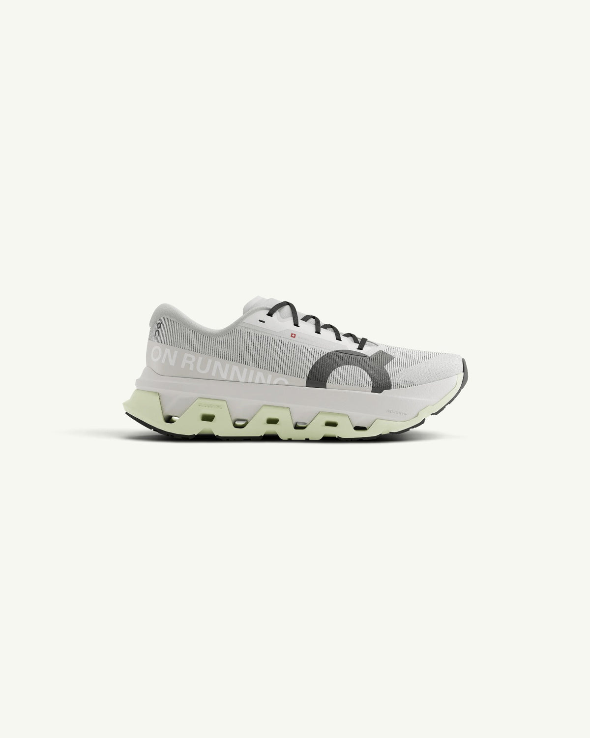 Amateur Men's Cloudmonster 3 Hyper running shoe in light grey with a thick, bouncy pale green CloudTec sole.