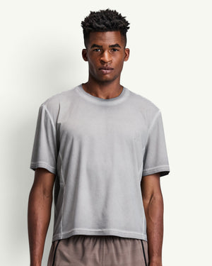 Amateur men's grey FrioSoft perforated boxy t-shirt with SaltFade finish worn by a model against a light background.