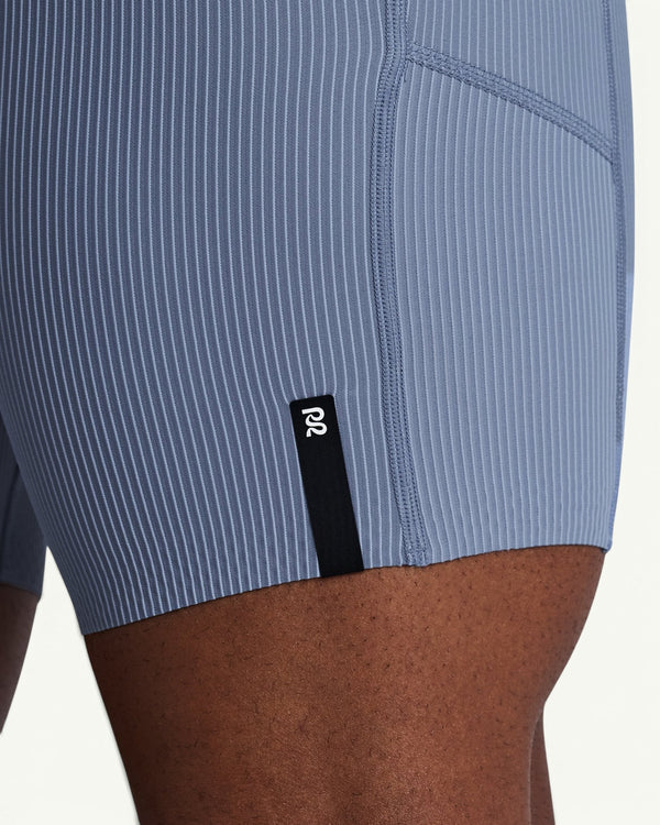 Amateur Men's Gridlock quarter tights in blue double-pique knit fabric with a side pocket and logo detail.