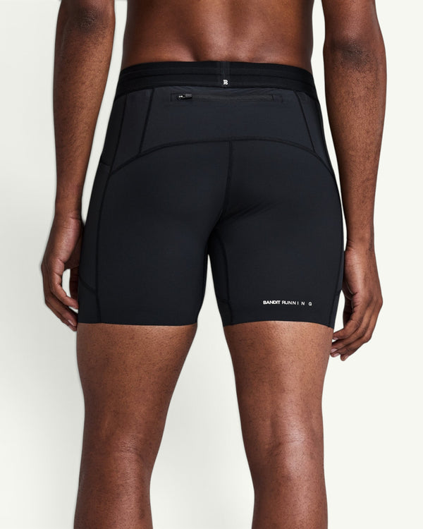 Amateur men's black SoLite quarter compression running tights with a rear zippered pocket and sleek moisture-wicking fit