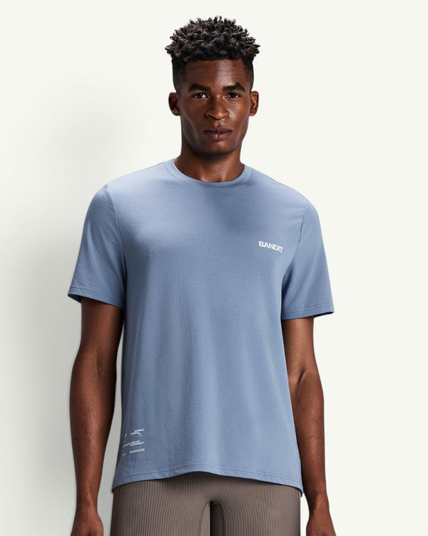 Amateur men's blue Micromesh run tee with crew neckline and reflective detailing worn by a male model
