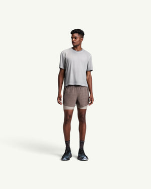 Amateur men's CoolGrid 2-in-1 running shorts in taupe with integrated compression liner and multiple storage pockets