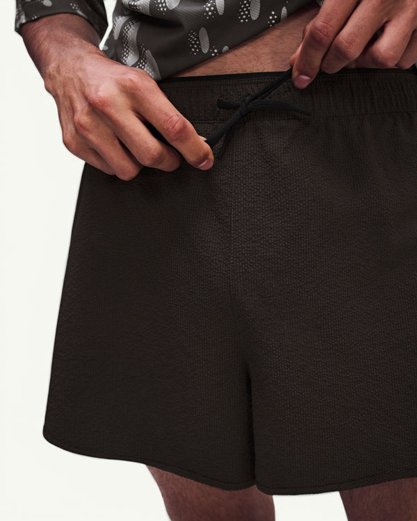 Amateur Men's Performance Volt shorts in dark brown, featuring a lightweight textured fabric and adjustable drawstring.