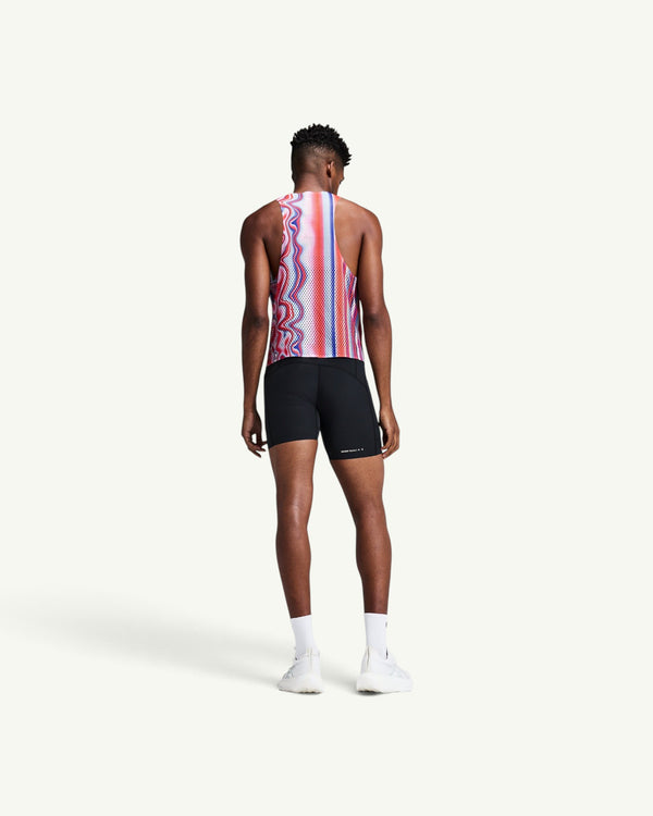 Amateur men's black SoLite quarter tights worn by a male athlete from the back view, paired with a patterned singlet.