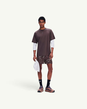 Amateur Men's Trail-T Solar brown short-sleeve hiking shirt with UV protection worn by a model with trail gear