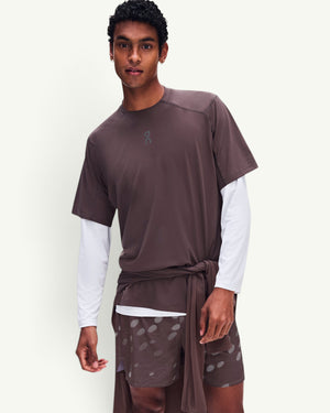 Amateur Men's Trail-T Solar in dark brown, a durable, breathable UV-protective hiking tee worn by a male model.