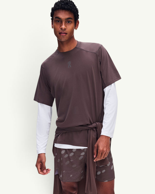 Amateur Men's Trail-T Solar in dark brown, a durable, breathable UV-protective hiking tee worn by a male model.