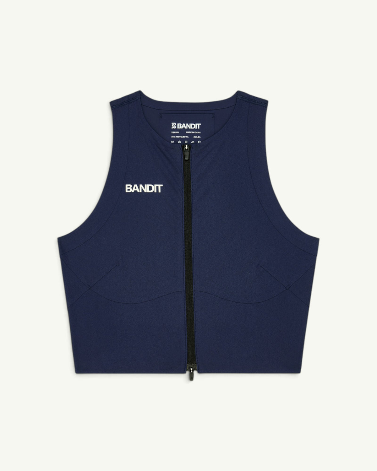 Amateur women's navy blue Adapto compression crop top with a two-way front zipper and white logo branding.