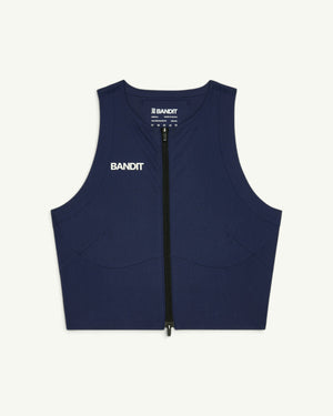 Amateur women's navy blue Adapto compression crop top with a two-way front zipper and white logo branding.