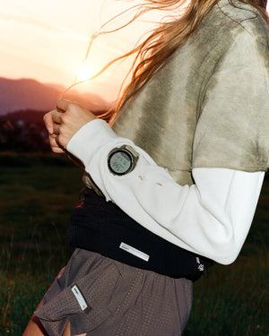 Amateur SATISFY COROS APEX 4 multisport watch in Burnt Olive with a unique ice crystalized titanium bezel on a runner