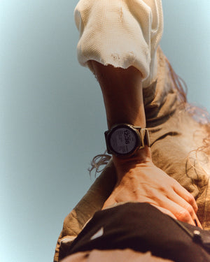 Amateur SATISFY COROS APEX 4 multisport watch in burnt olive with a unique ice crystalized titanium bezel on a wrist