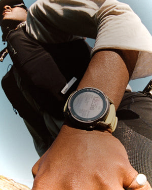 Amateur SATISFY COROS APEX 4 multisport watch in burnt olive with a unique ice crystalized titanium bezel on a runner