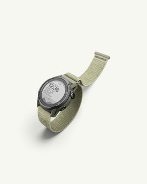 Amateur SATISFY COROS APEX 4 multisport watch in Burnt Olive with a unique crystalized titanium bezel and nylon band.