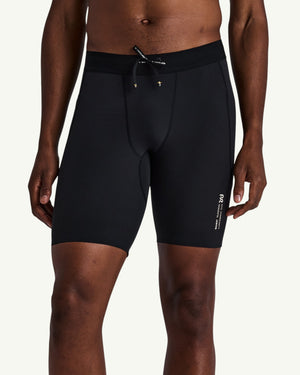 Amateur men's black SoLite compression half tights with an adjustable drawstring waist and five storage pockets.