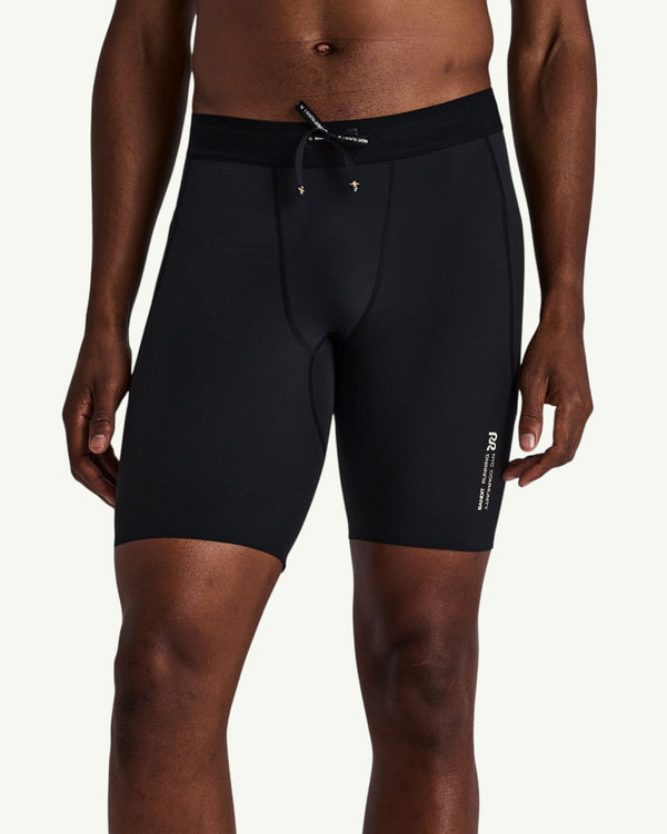 Amateur men's black SoLite compression half tights with an adjustable drawstring waist and five storage pockets.