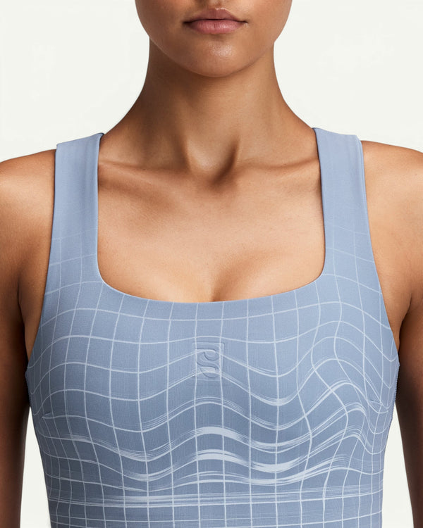 Amateur women's light blue square neck race crop top with a subtle white grid pattern and buttery smooth fabric.