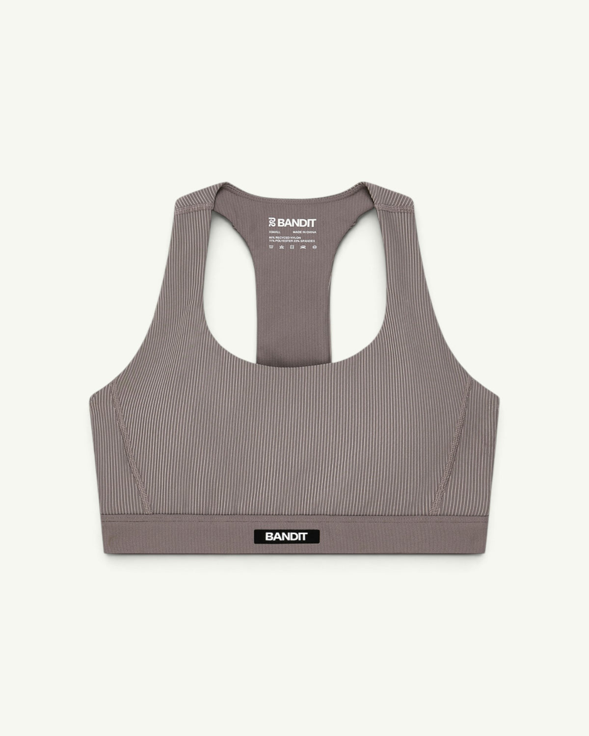 Amateur women's taupe ribbed scoop neck T-back sports bra with compression fit and Bandit branding