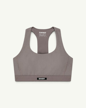 Amateur women's taupe ribbed scoop neck T-back sports bra with compression fit and Bandit branding