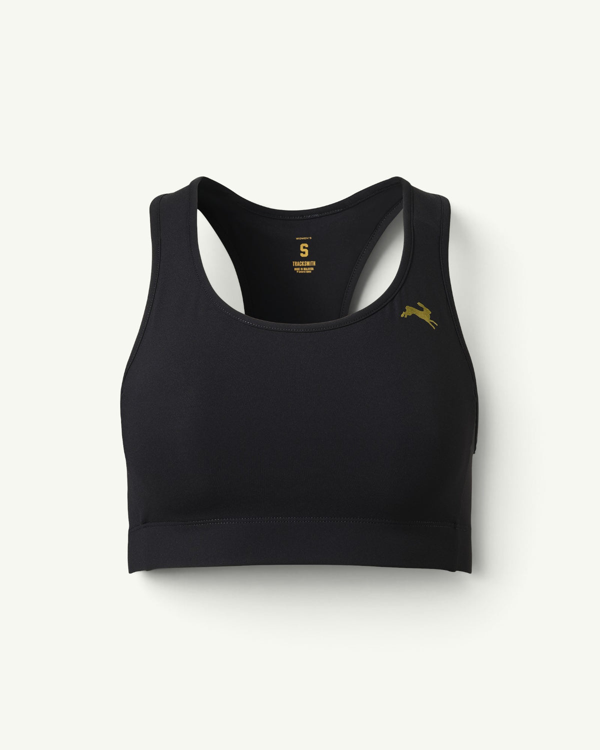 Amateur Tracksmith Allston sports bra in black with a gold hare logo, featuring a supportive racerback design.