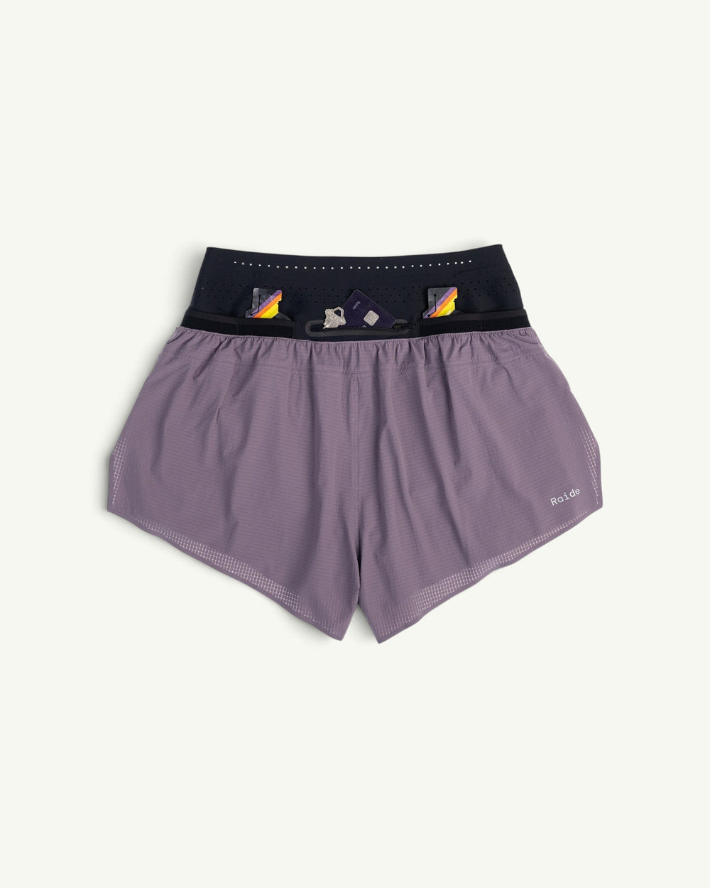 Amateur Women's TrailTech 4-inch mountain running shorts in mauve with a black waistband and reflective logo detail.